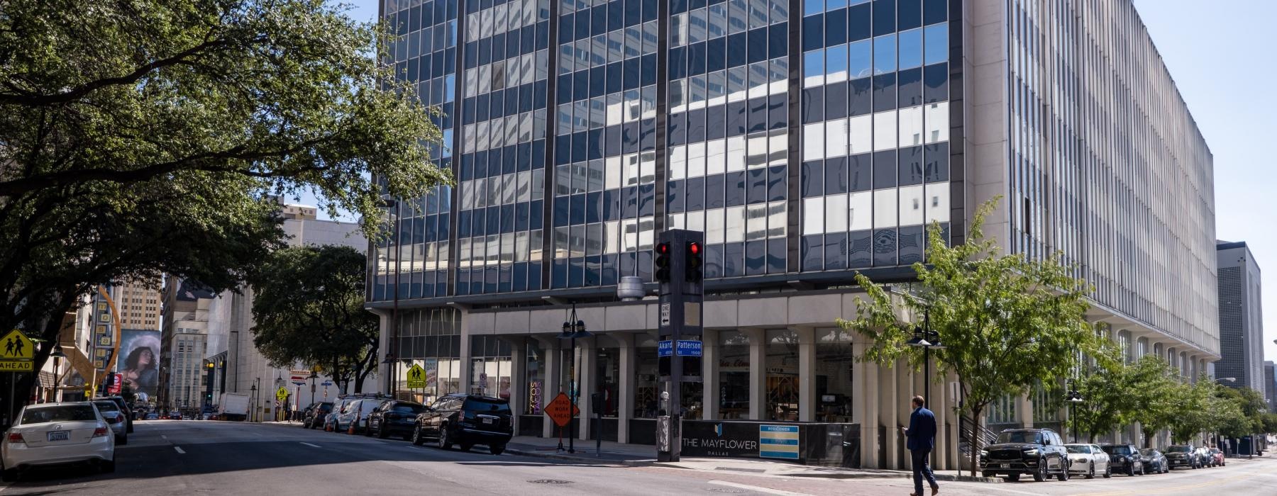 a large building with a street in front of it