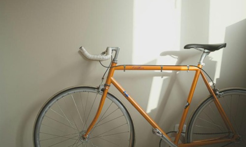 a bicycle parked in a room